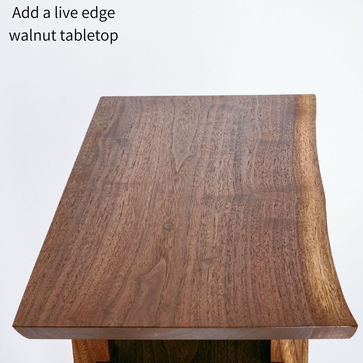 A narrow end table with a live edge tabletop option from Mokuzai Furniture.