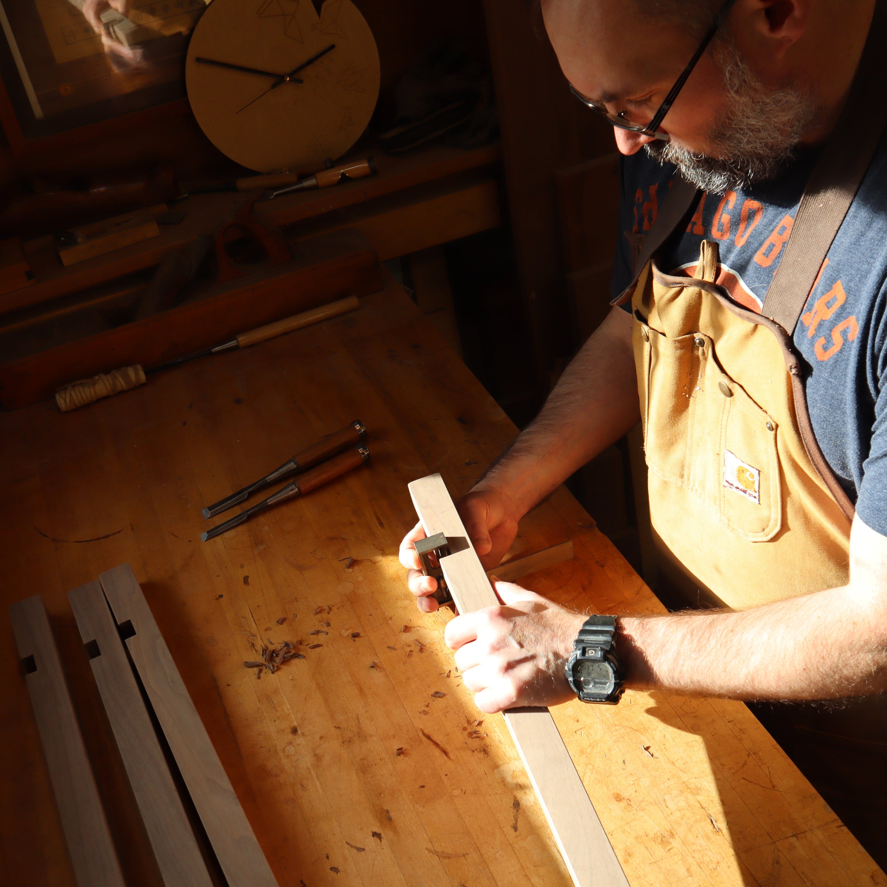 measuring the details of a hall table at Mokuzai Furniture