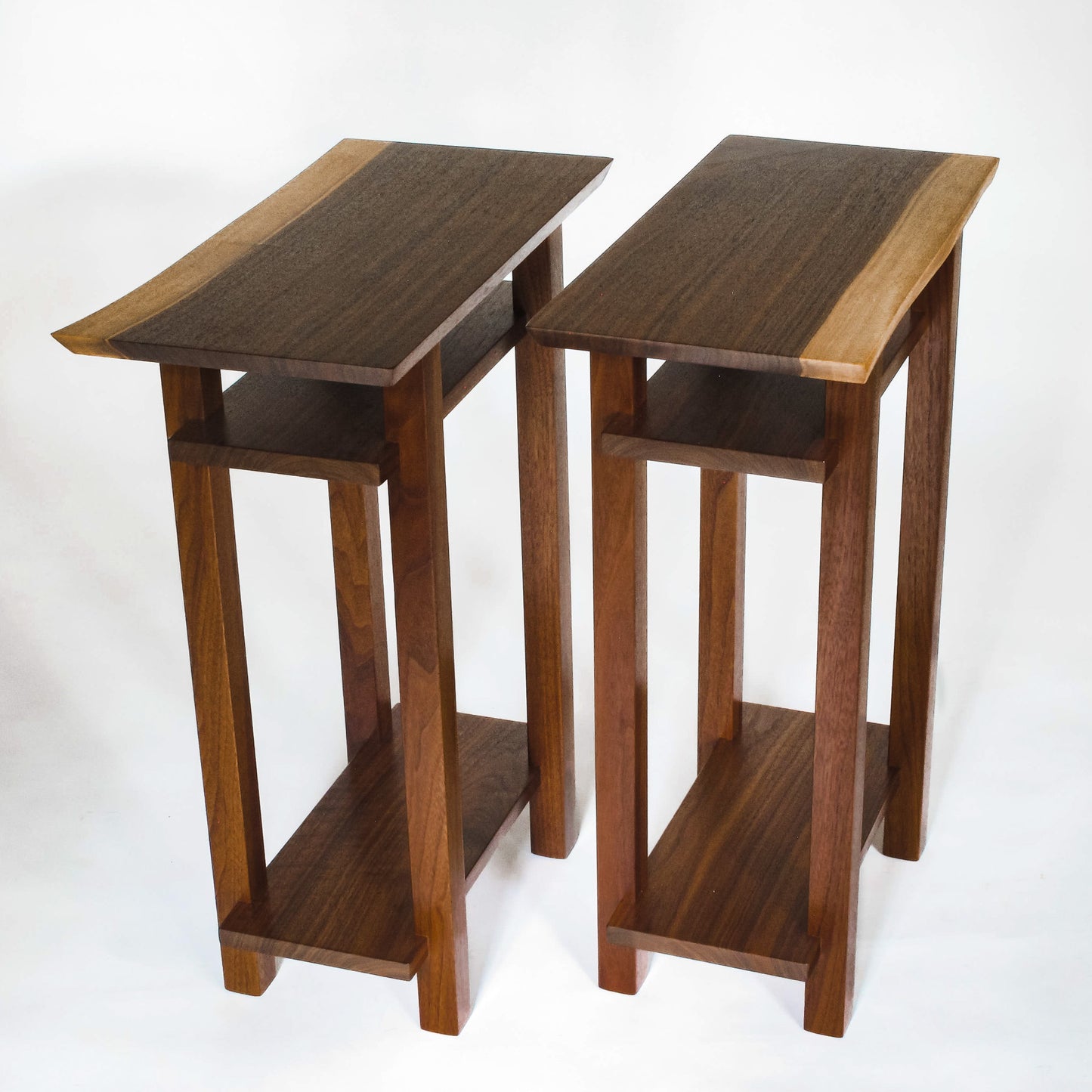 A pair of live edge walnut narrow end tables from Mokuzai Furniture.