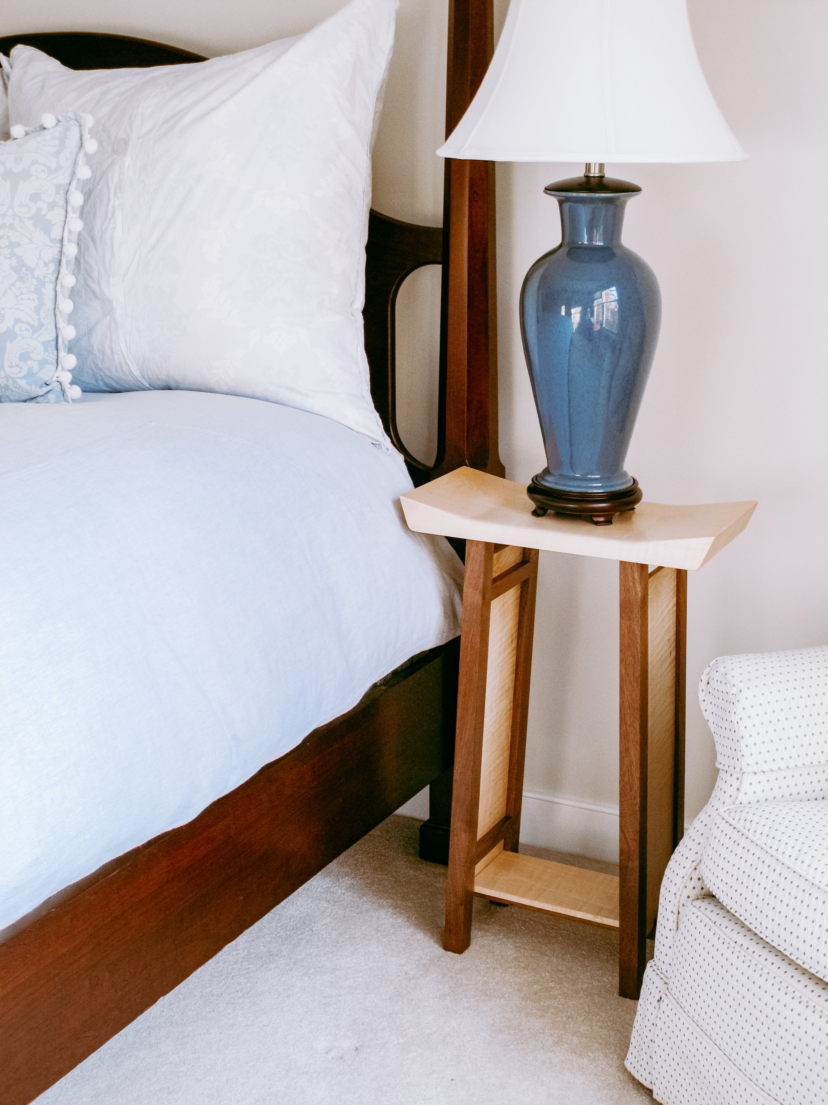 a unique nightstand table for bedrooms with a low shelf and shaped table top.  This narrow accent table is beautiful as a living room table as well.  A small narrow side table, our Shaped Side Table has so many wonderful details!