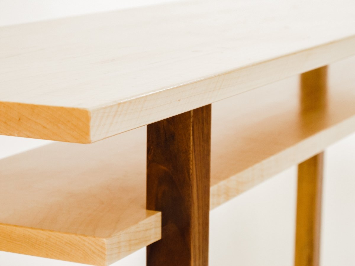 narrow console table in tiger maple with walnut legs - contrasting wood colors - artistic wooden furniture