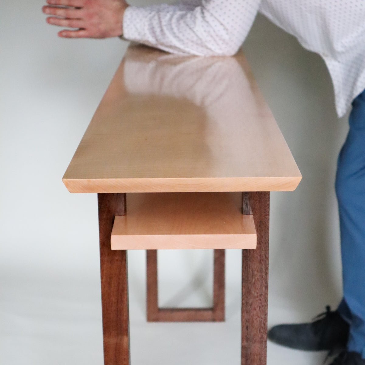 a long narrow console table for hallways by Mokuzai Furniture.