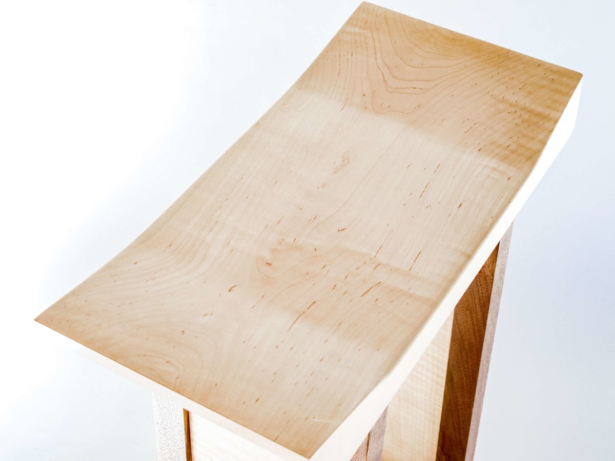 saddle seat modern bar stools by Mokuzai Furniture