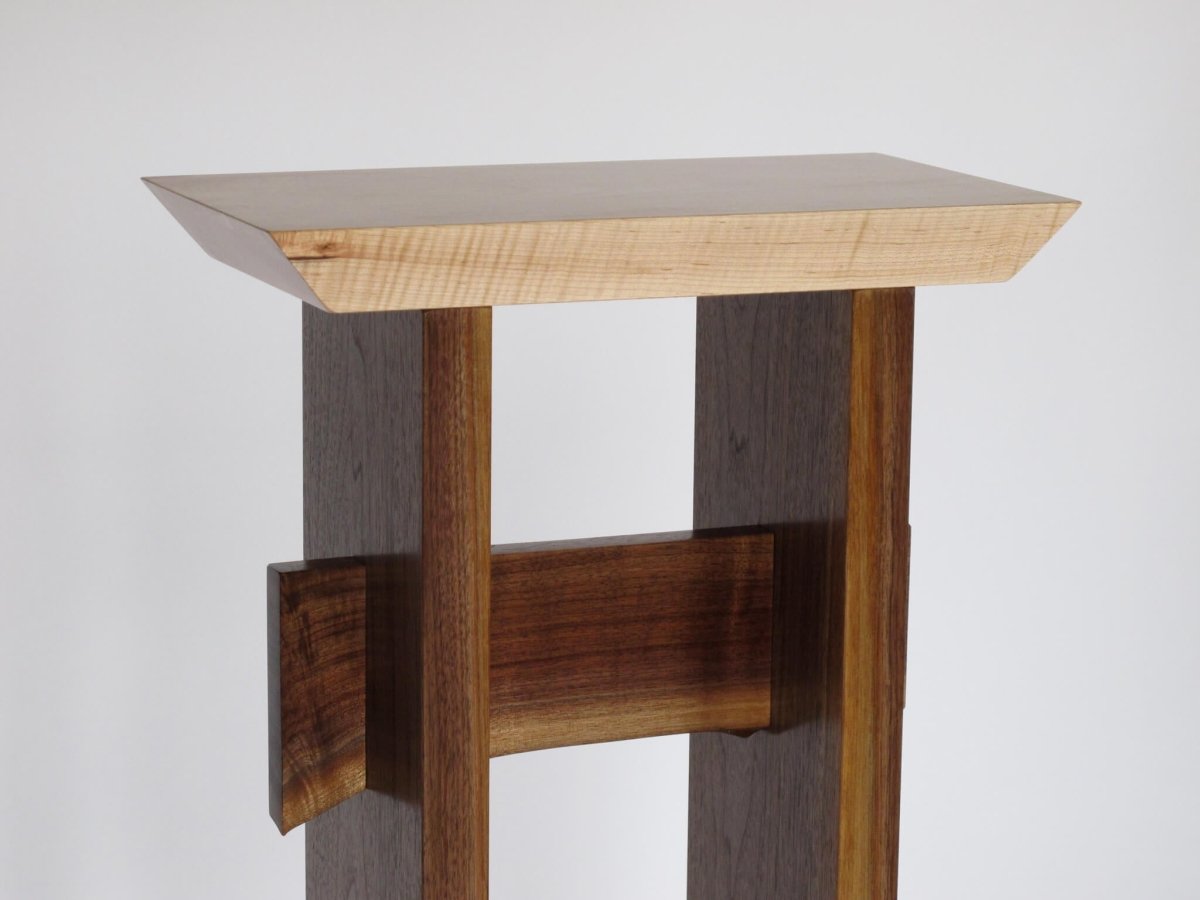 A small table for entryways and foyers with artistic Zen styling and handmade from premium solid wood by Mokuzai Furniture.