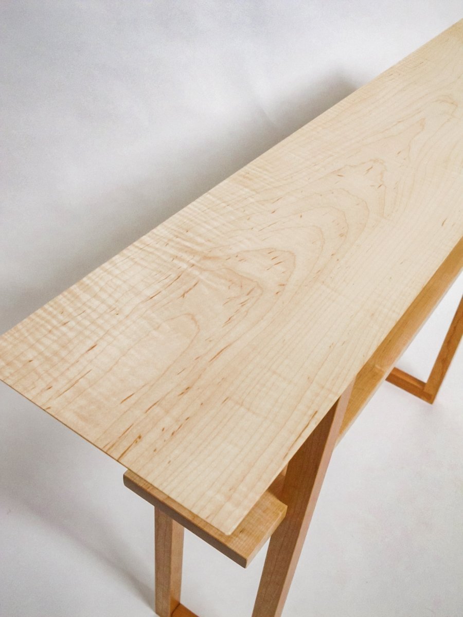 Beautiful grain patterns in the tiger maple table top of this narrow console table. A sofa table, hallway table or entryway console table by Mokuzai Furniture