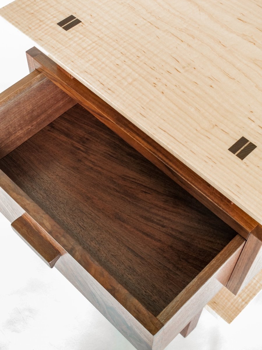 Even the drawer bottoms are beautiful. Using the same premium wood throughout our fine furniture, this picture shows the drawer interior of our Encore Nightstand