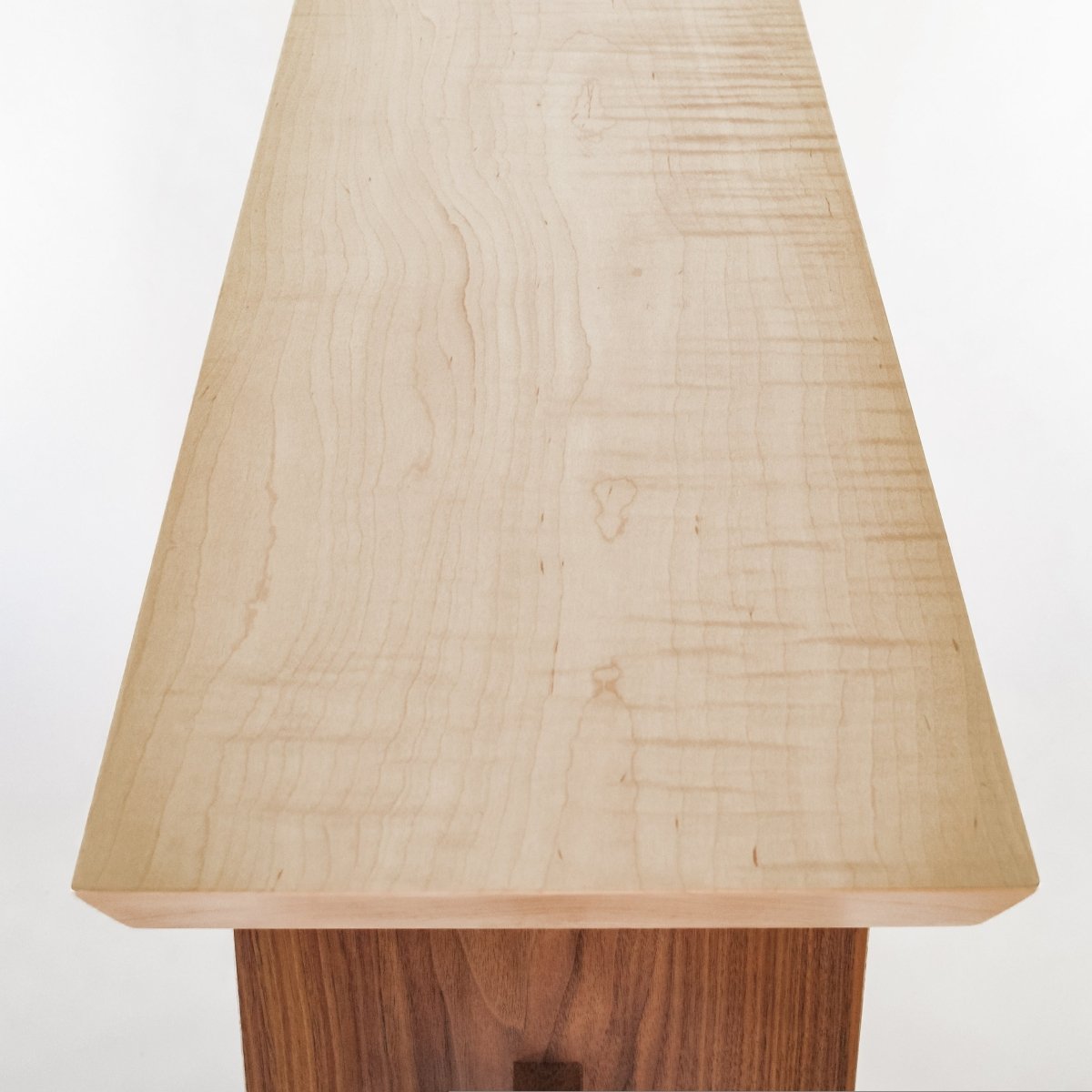 at only 10 inches deep, this narrow hall table works well for small space decorating - tiger maple table top on the Statement Hall Table by Mokuzai Furniture