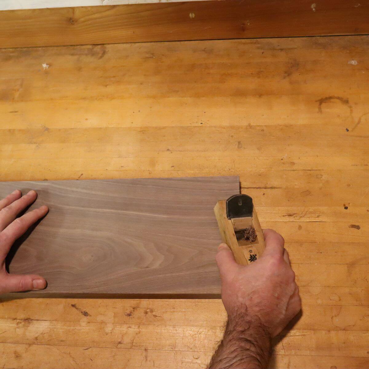 a traditional Japanese block plane is used by a fine furniture maker to create a modern console table at Mokuzai Furniture