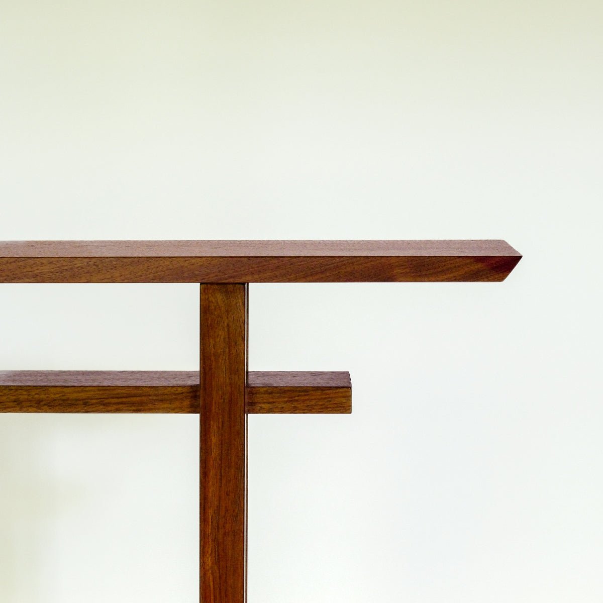 A modern Japanese console table design for a narrow entry way table or narrow side table from Mokuzai Furniture.