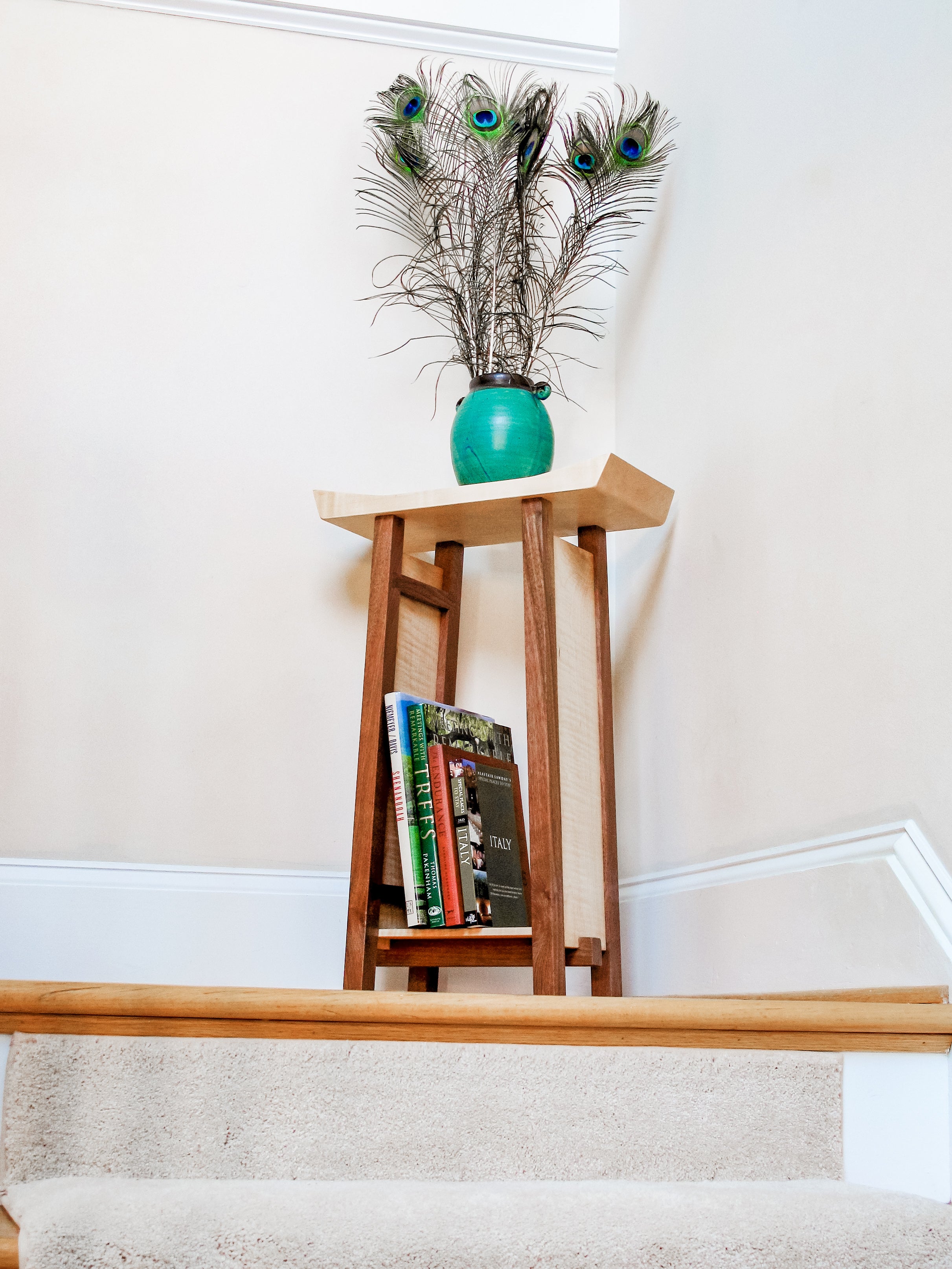 A unique side table for the stair landing with small bookshelf by Mokuzai Furniture