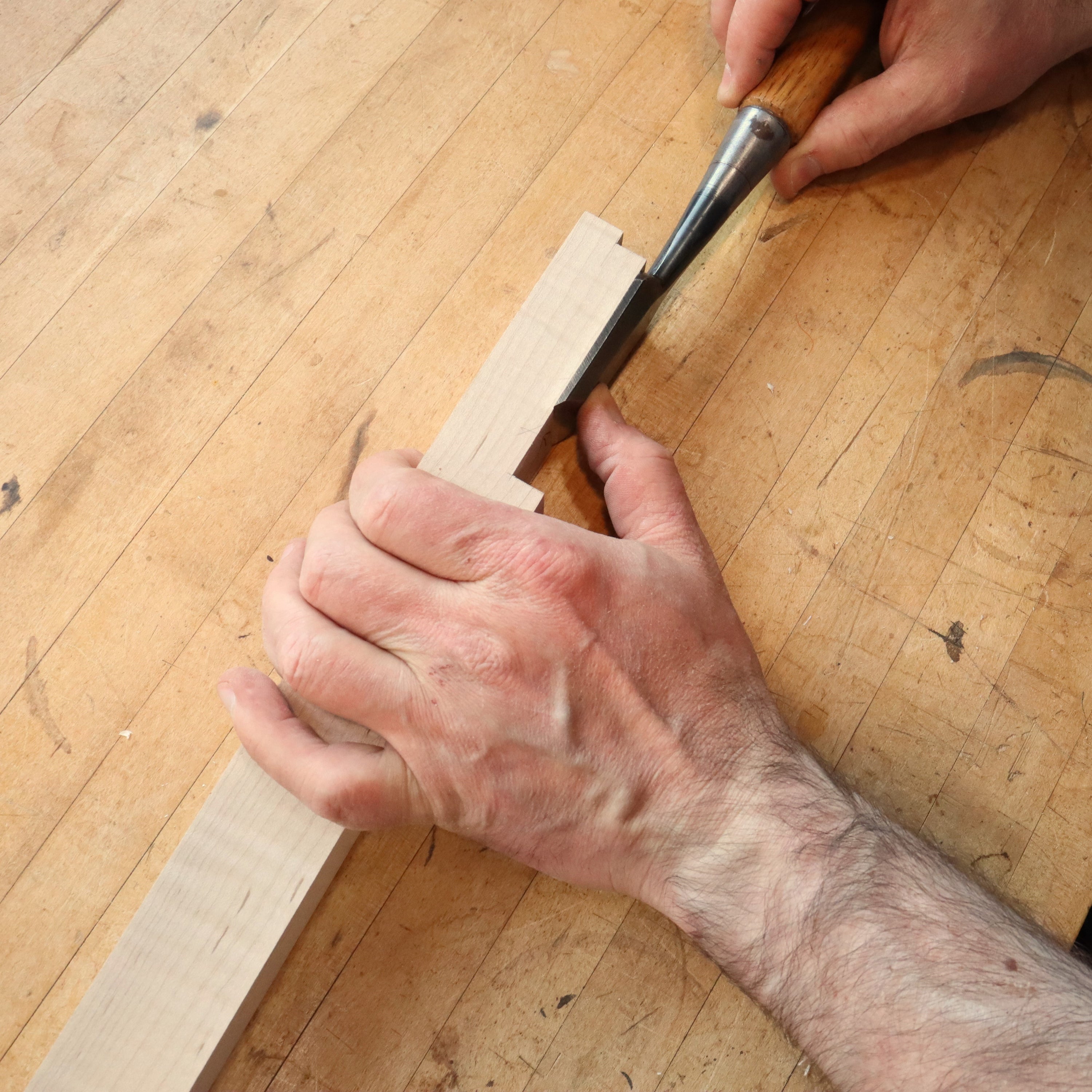 cutting joinery for table legs on an end table with drawer at Mokuzai Furniture