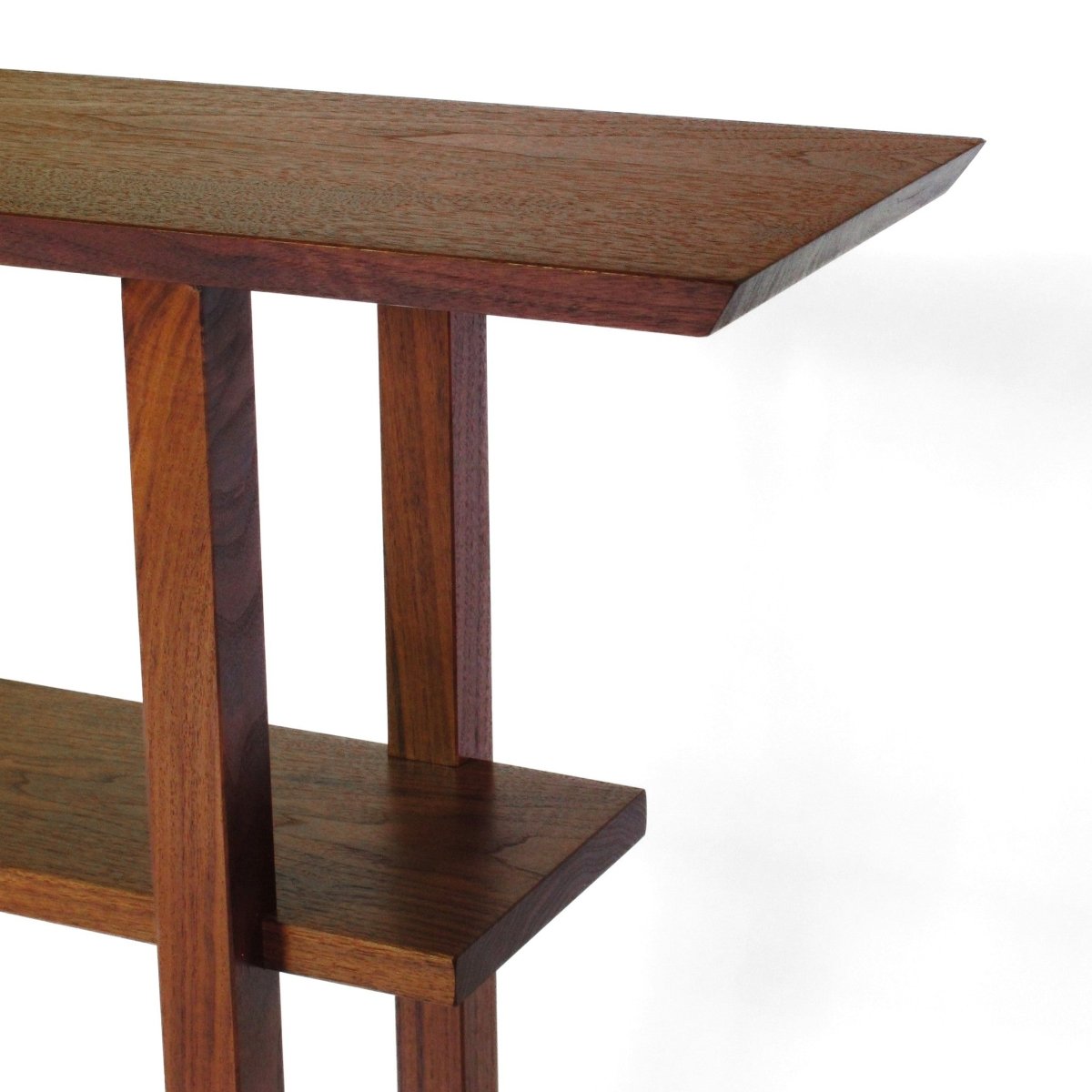 A handcrafted modern walnut sofa table from Mokuzai Furniture.