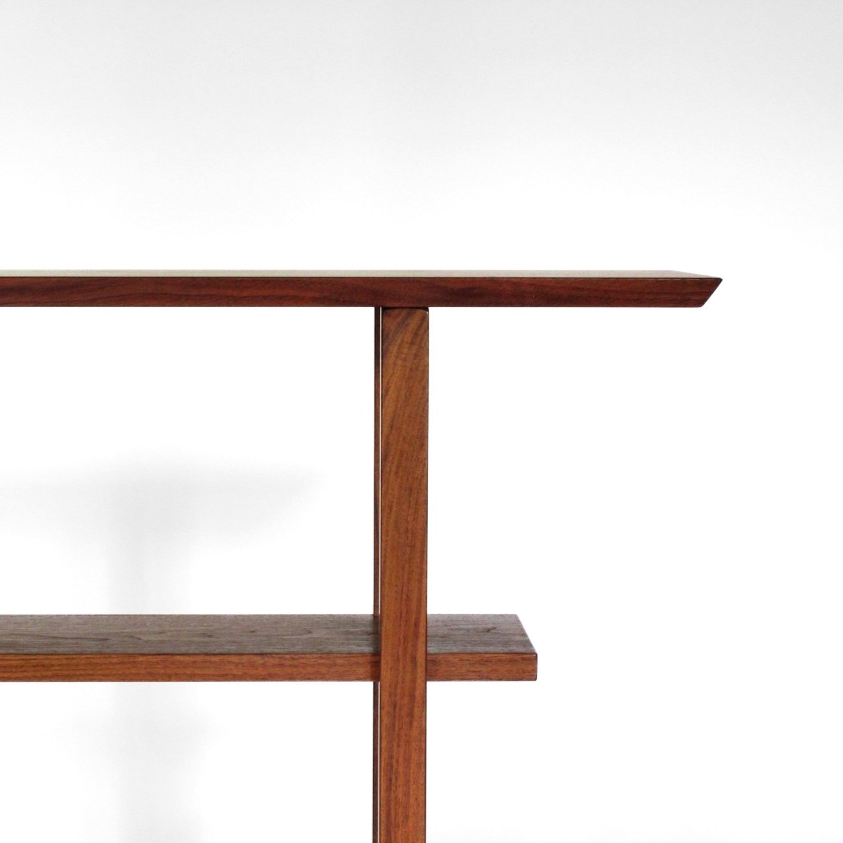 A modern walnut console table for entryways, hallways or a walnut sofa table from Mokuzai Furniture.