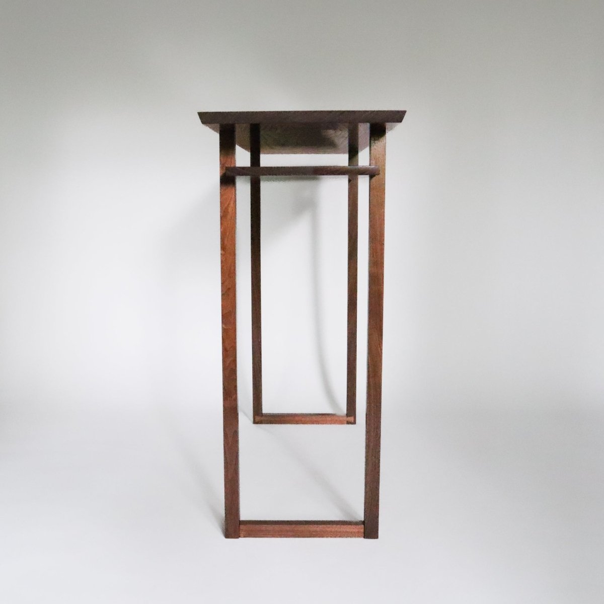 A narrow tv console table from Mokuzai Furniture.