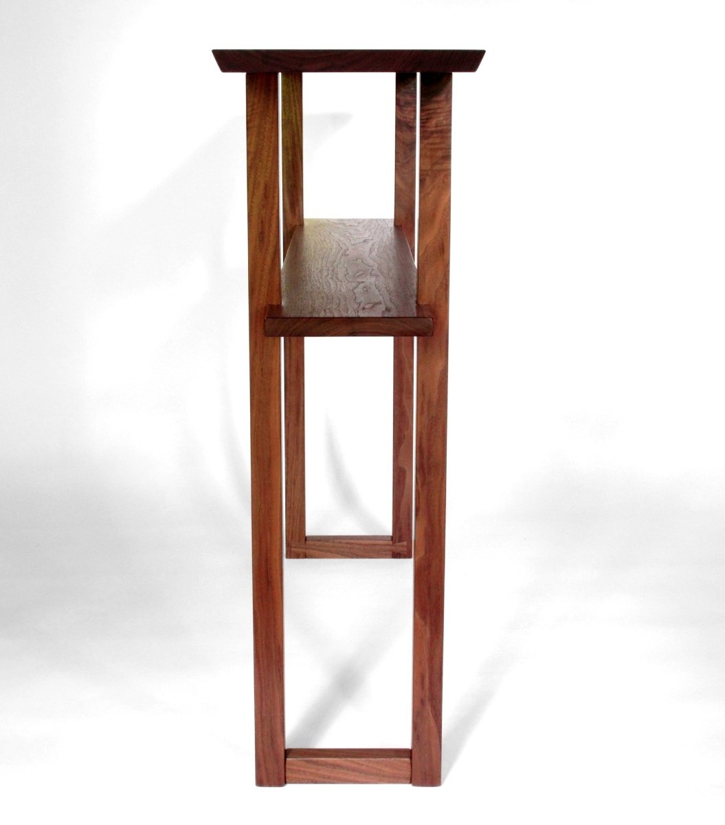 A narrow walnut console table for entryways and hallways from Mokuzai Furniture.