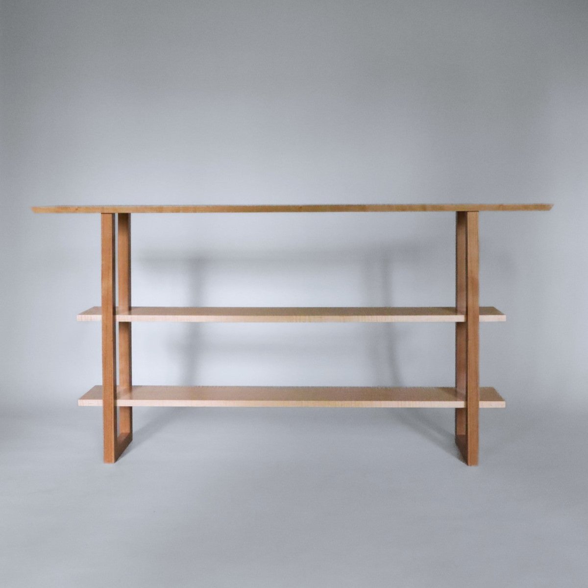cherry console table with two shelves by Mokuzai Furniture.