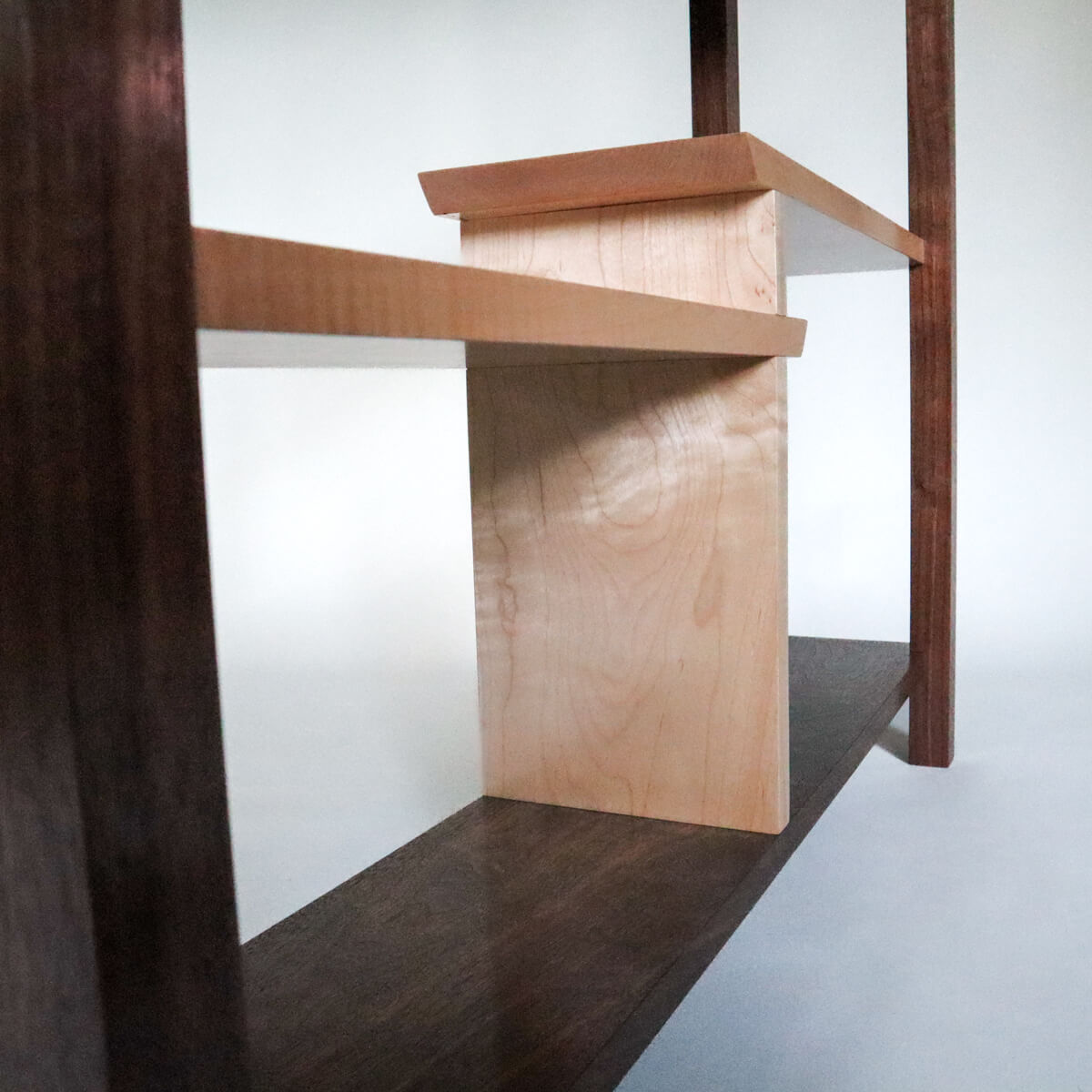 tiger maple display shelves on a walnut console table- narrow furniture design by Mokuzai Furniture