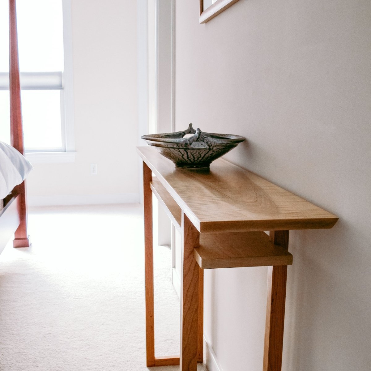 The classic console table makes a lovely narrow vanity table for bedrooms.