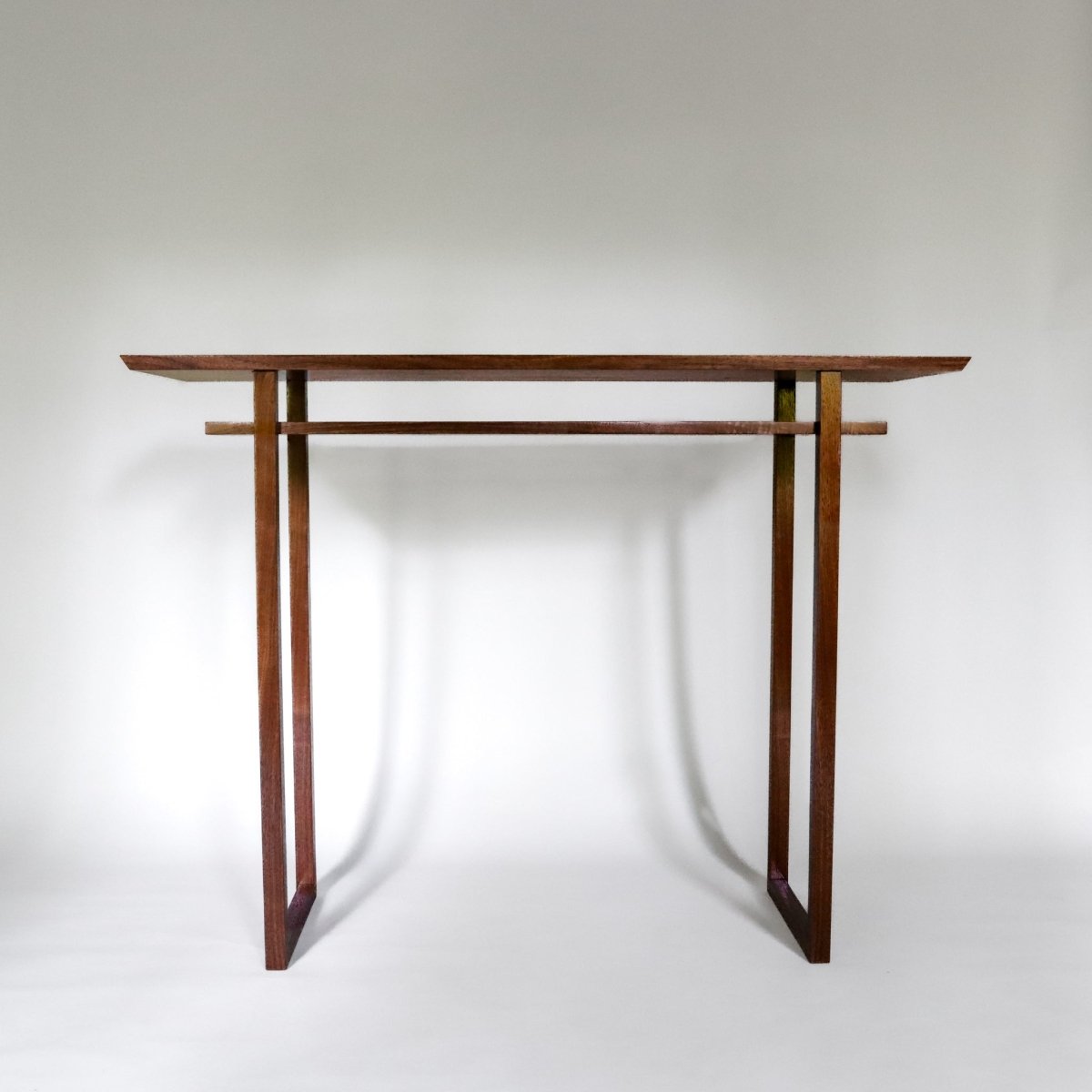 A walnut tv console table with Japanese style from Mokuzai Furniture.