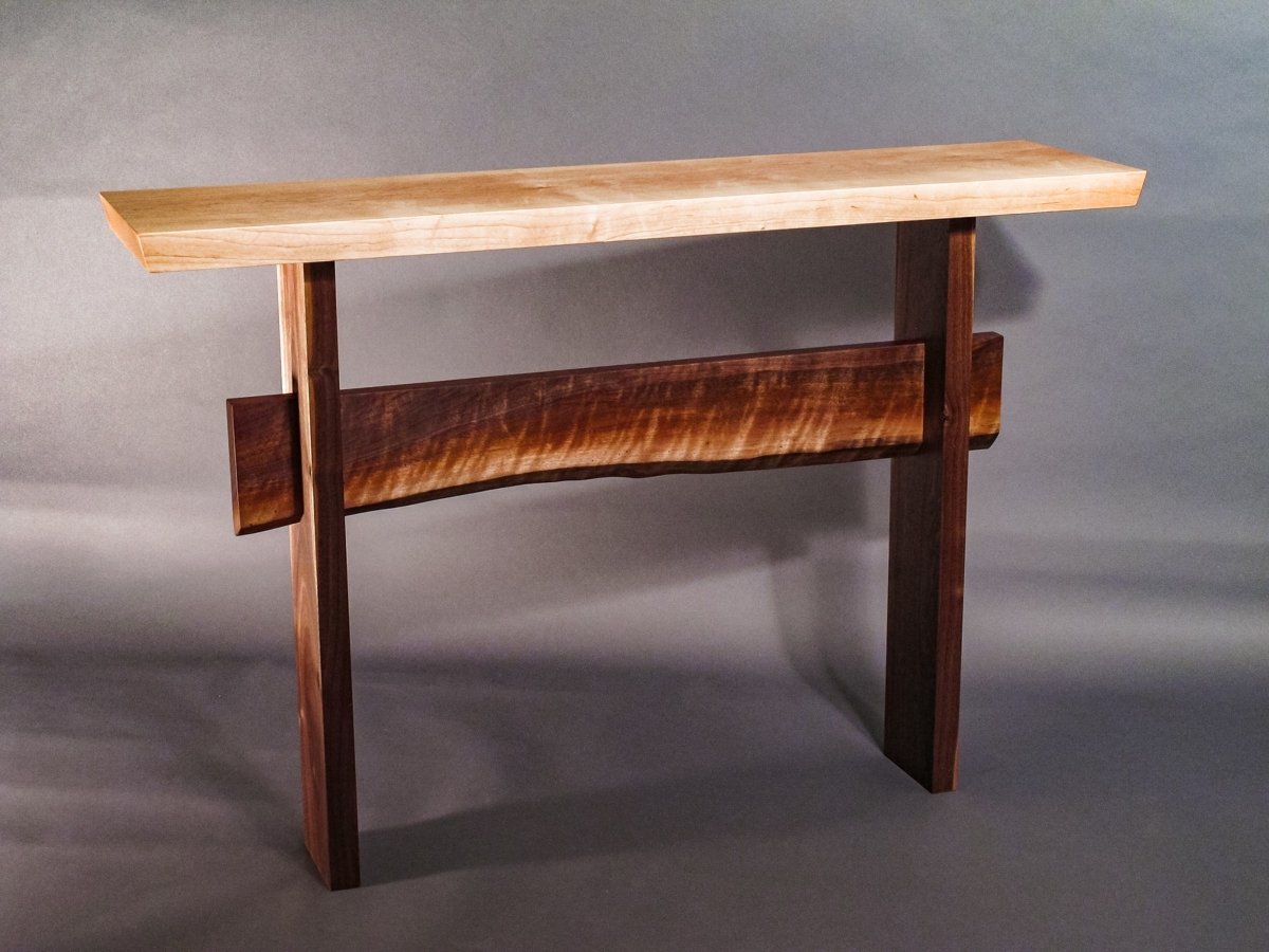 Our Statement Console Table with a live edge walnut stretcher
