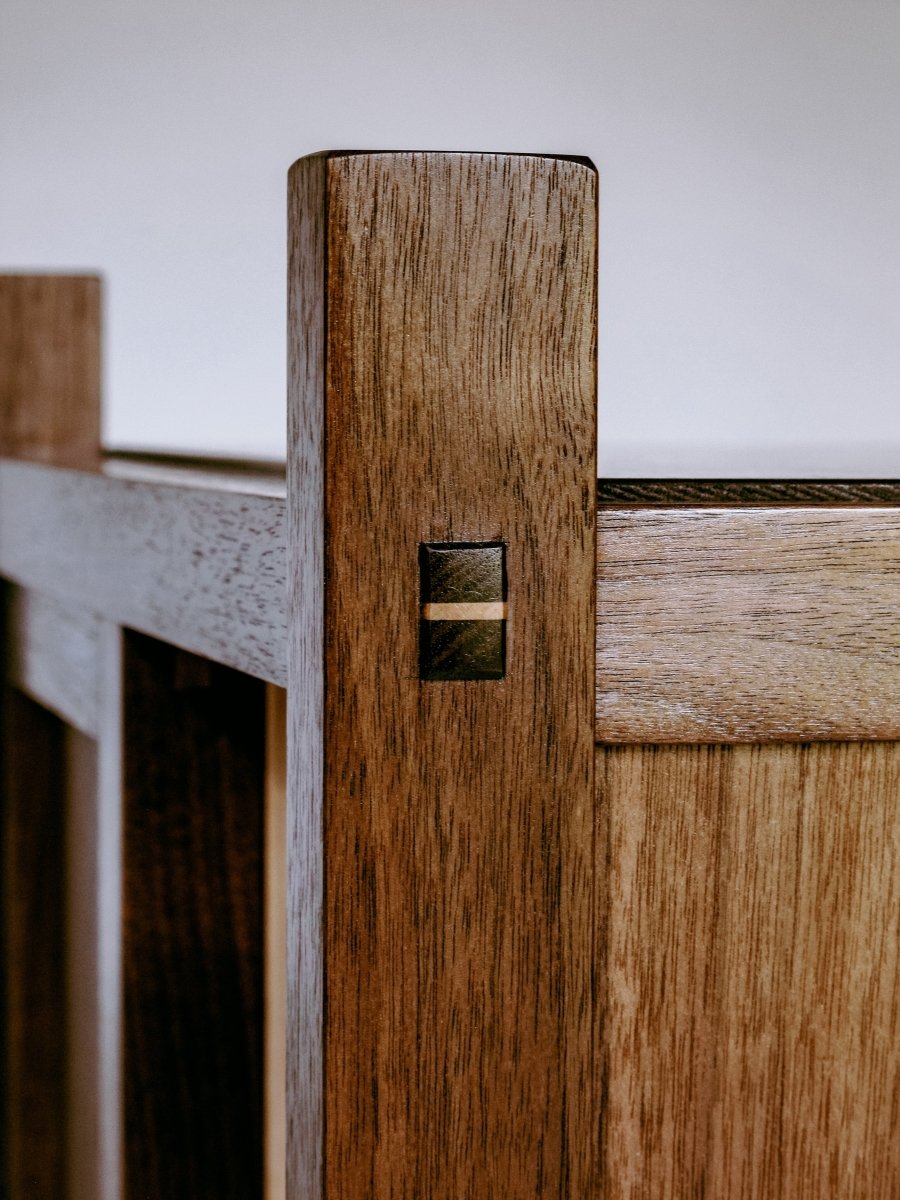 hand-cut mortise and tenon with wedge - modern bar cabinet in solid walnut