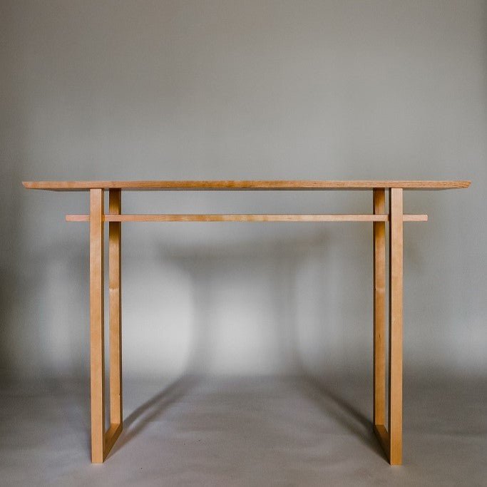A cherry console table for hallways or entryways by Mokuzai Furniture