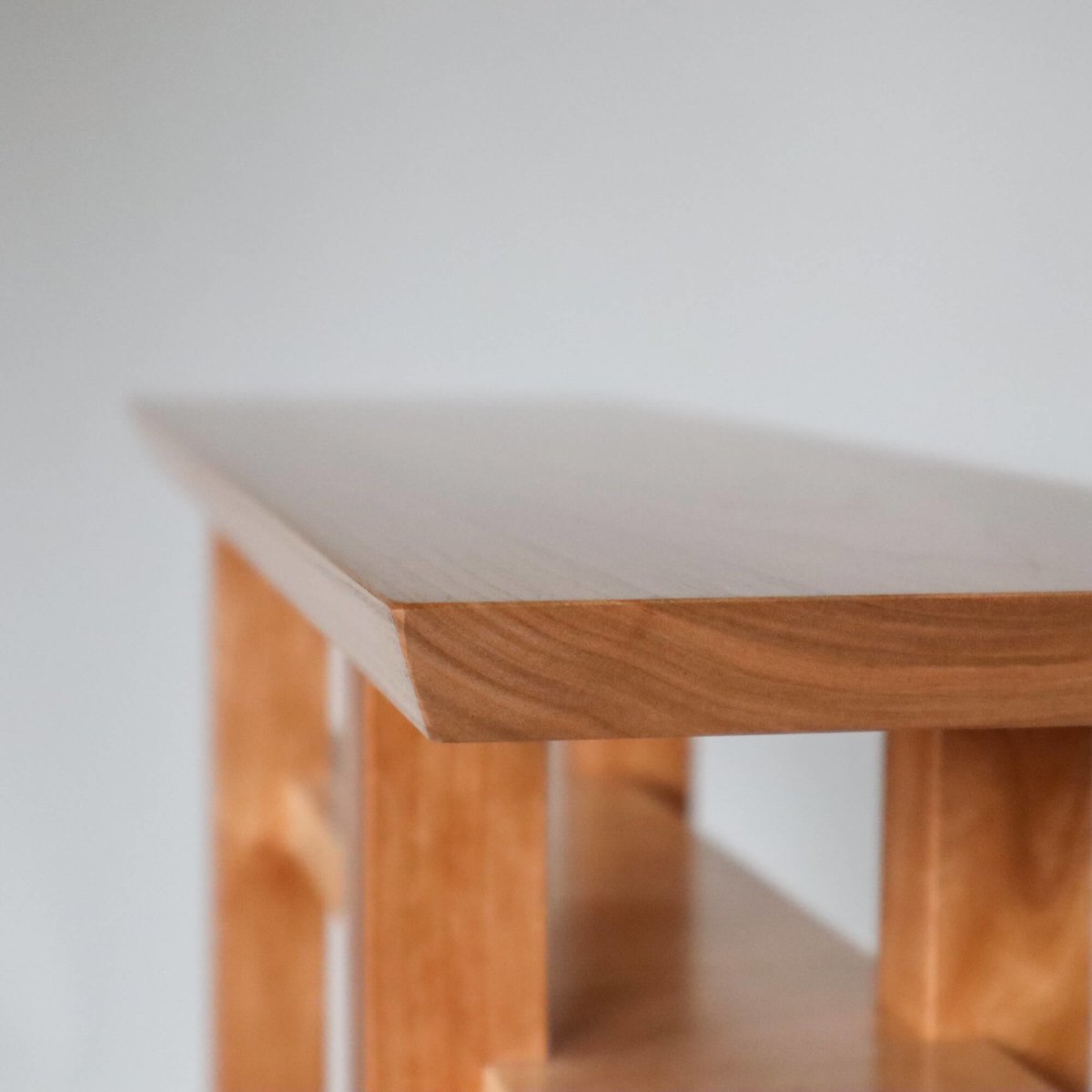 fine furniture design by Mokuzai Furniture- a cherry side table with shelf, modern console table with a flawless finish and fine details for contemporary interiors