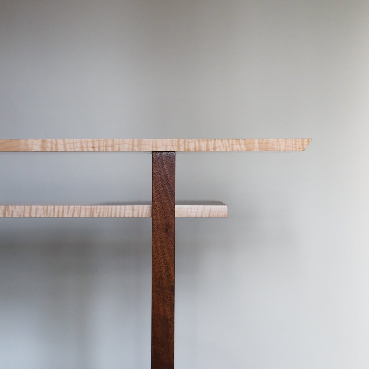 this is a console table with a shelf that was hand-crafted by Mokuzai Furniture.