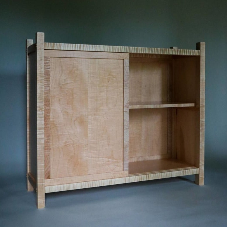 contemporary storage cabinet with door that slides by Mokuzai Furniture
