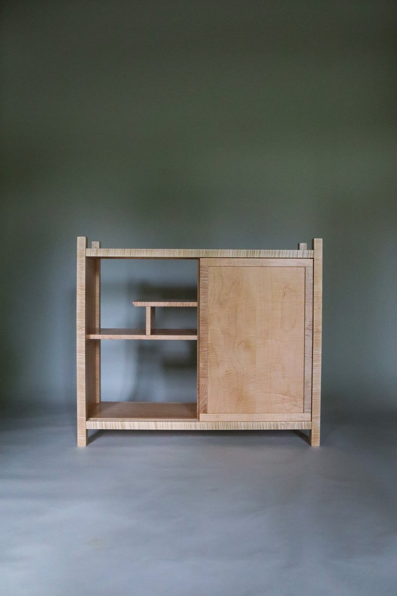 Modern wood cabinet with sliding door and display shelving by Mokuzai Furniture - mid-century modern furniture styling, contemporary home decor, entryway furniture with storage