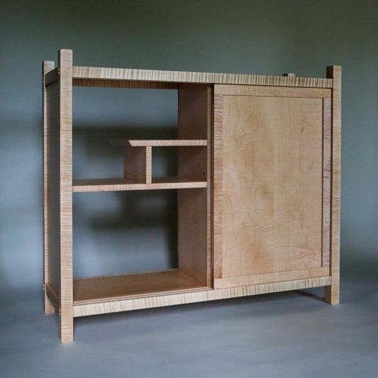 narrow wood cabinet with display shelving and storage by Mokuzai Furniture