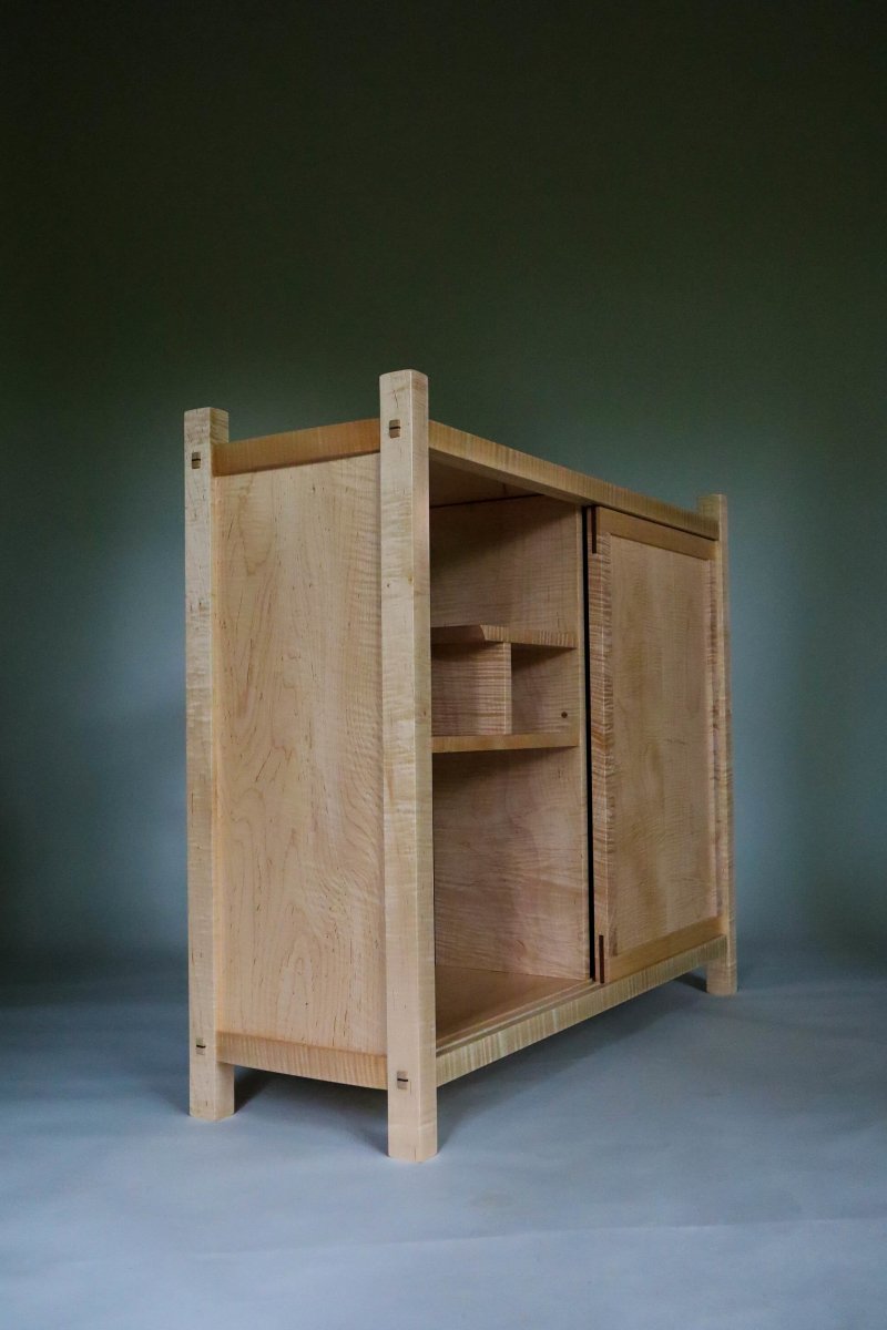 A modern TV console cabinet with display shelving and storage - contemporary furniture design by Mokuzai Furniture