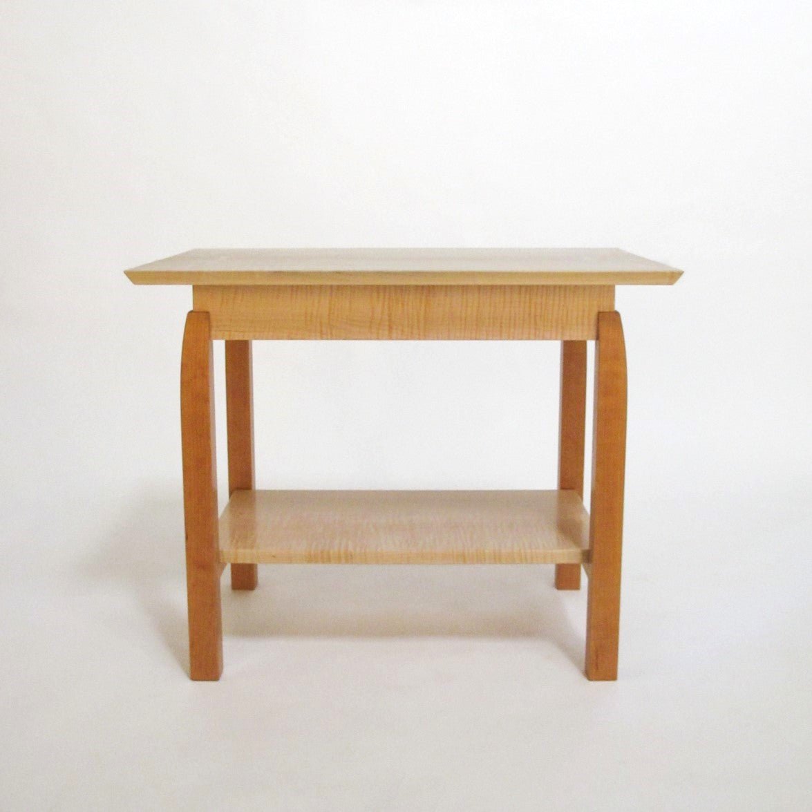 A contemporary side table with shelf, handmade by Mokuzai Furniture.