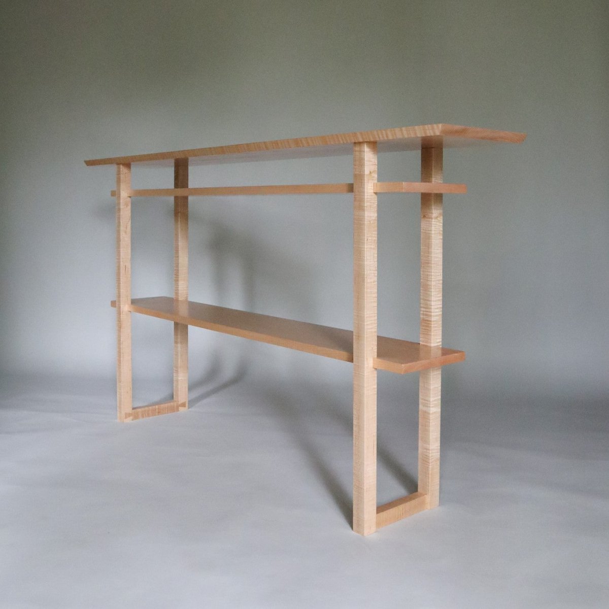 A hallway console table with shelves that is perfect as an entryway table too!  By Mokuzai Furniture