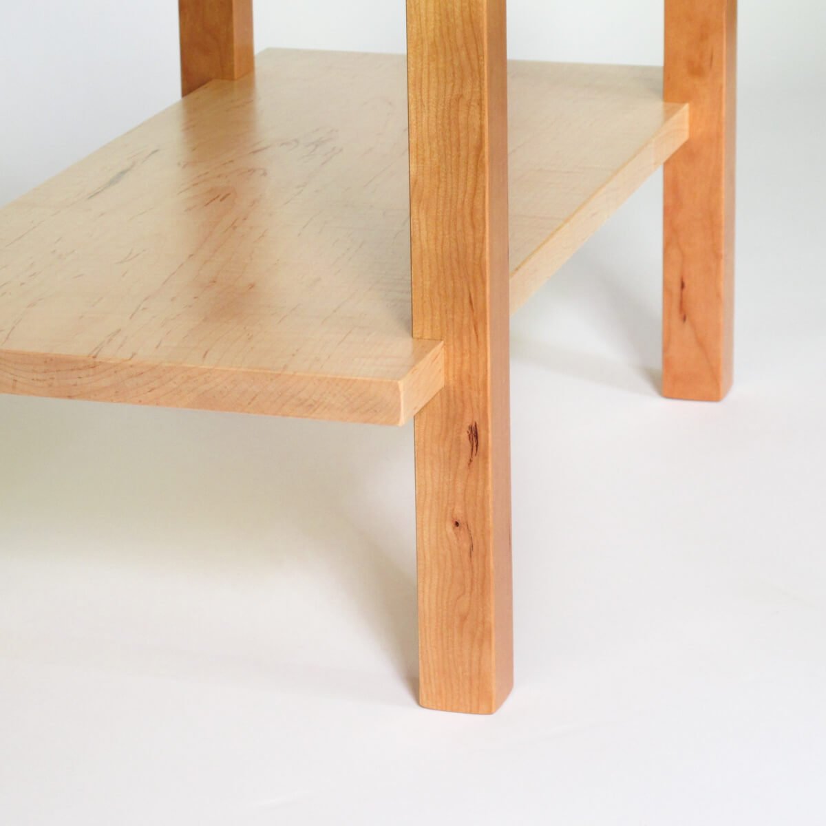 hand-cut joinery details on entry bench with shelf for shoe storage by Mokuzai Furniture