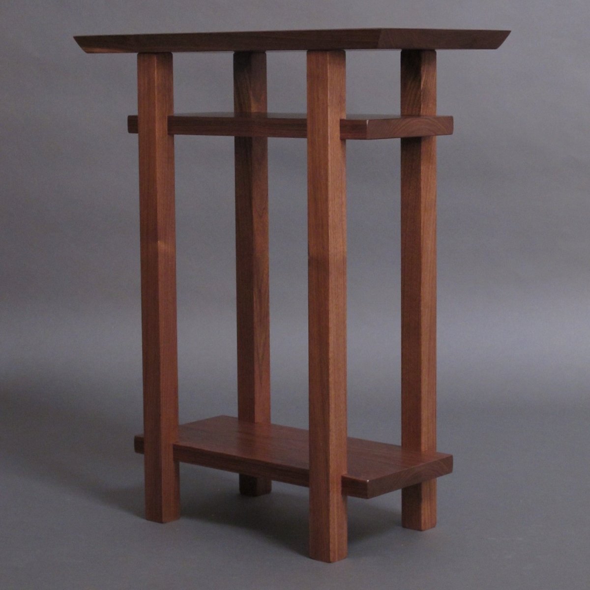 A mid century modern end table design by Mokuzai Furniture