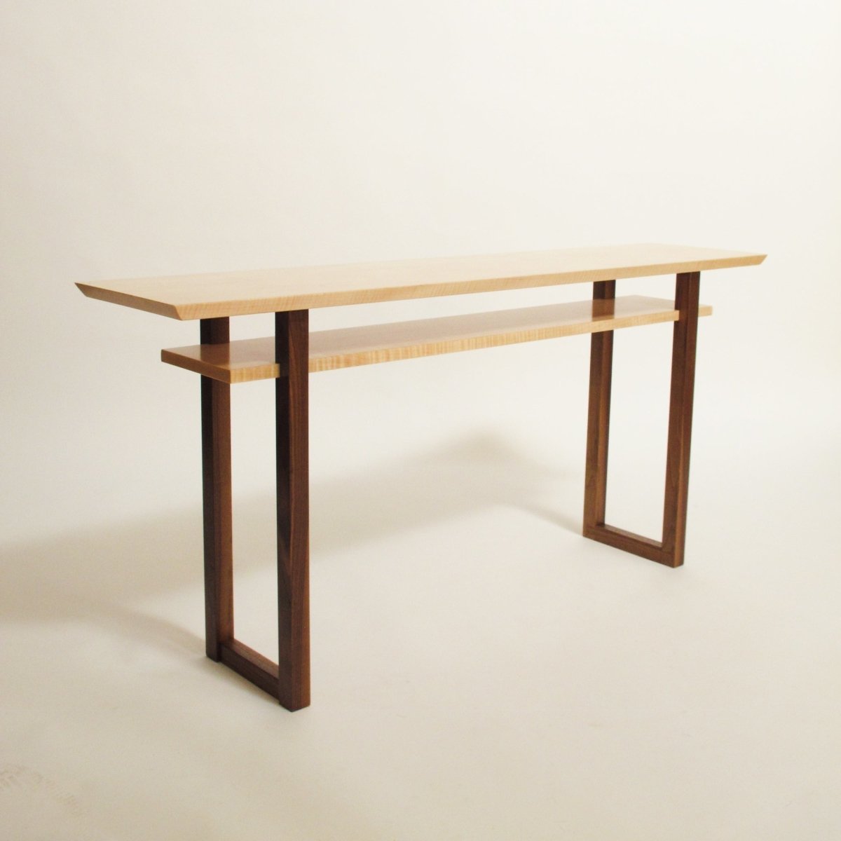 A minimalist art low console table by Mokuzai Furniture