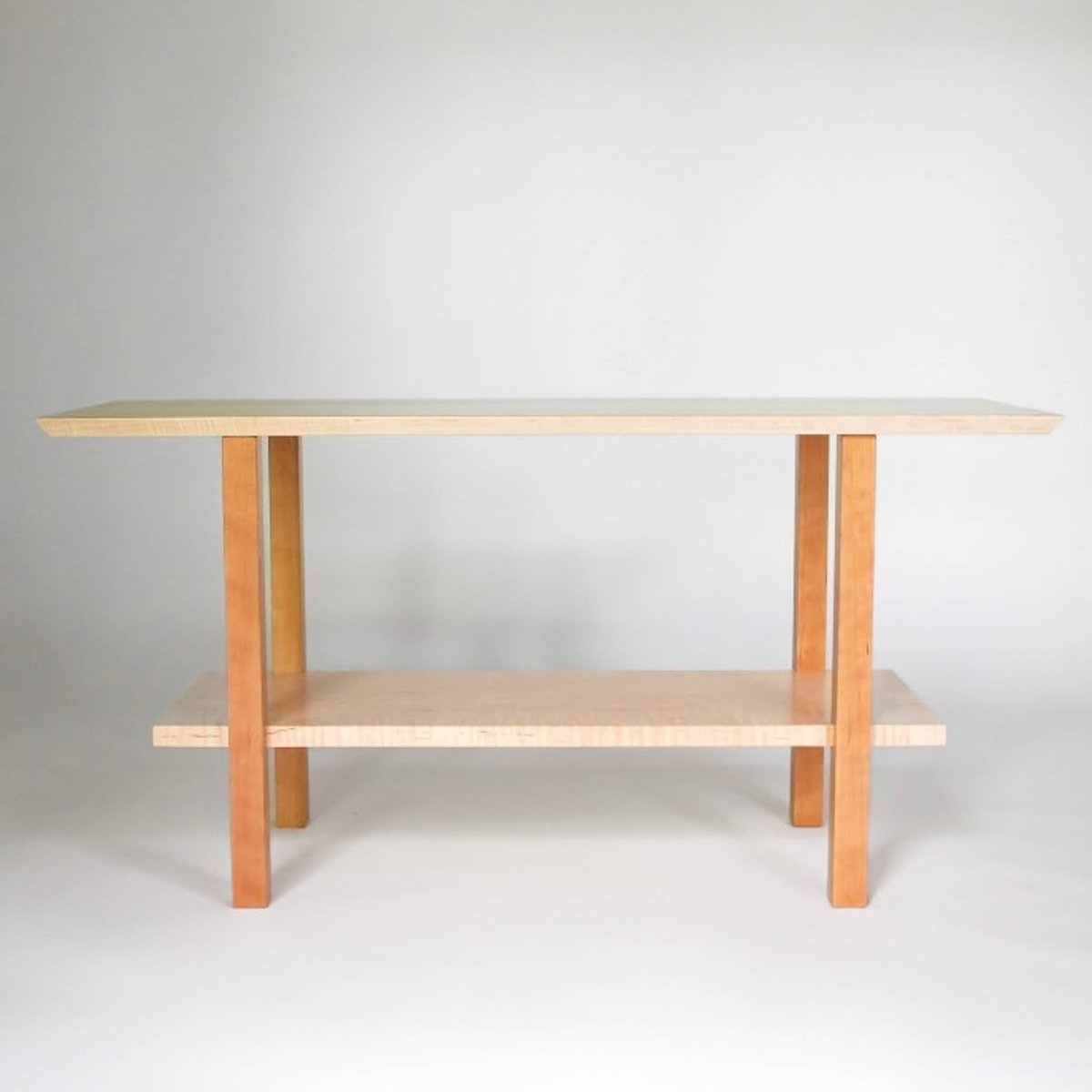 a minimalist entry bench with shelf by Mokuzai Furniture
