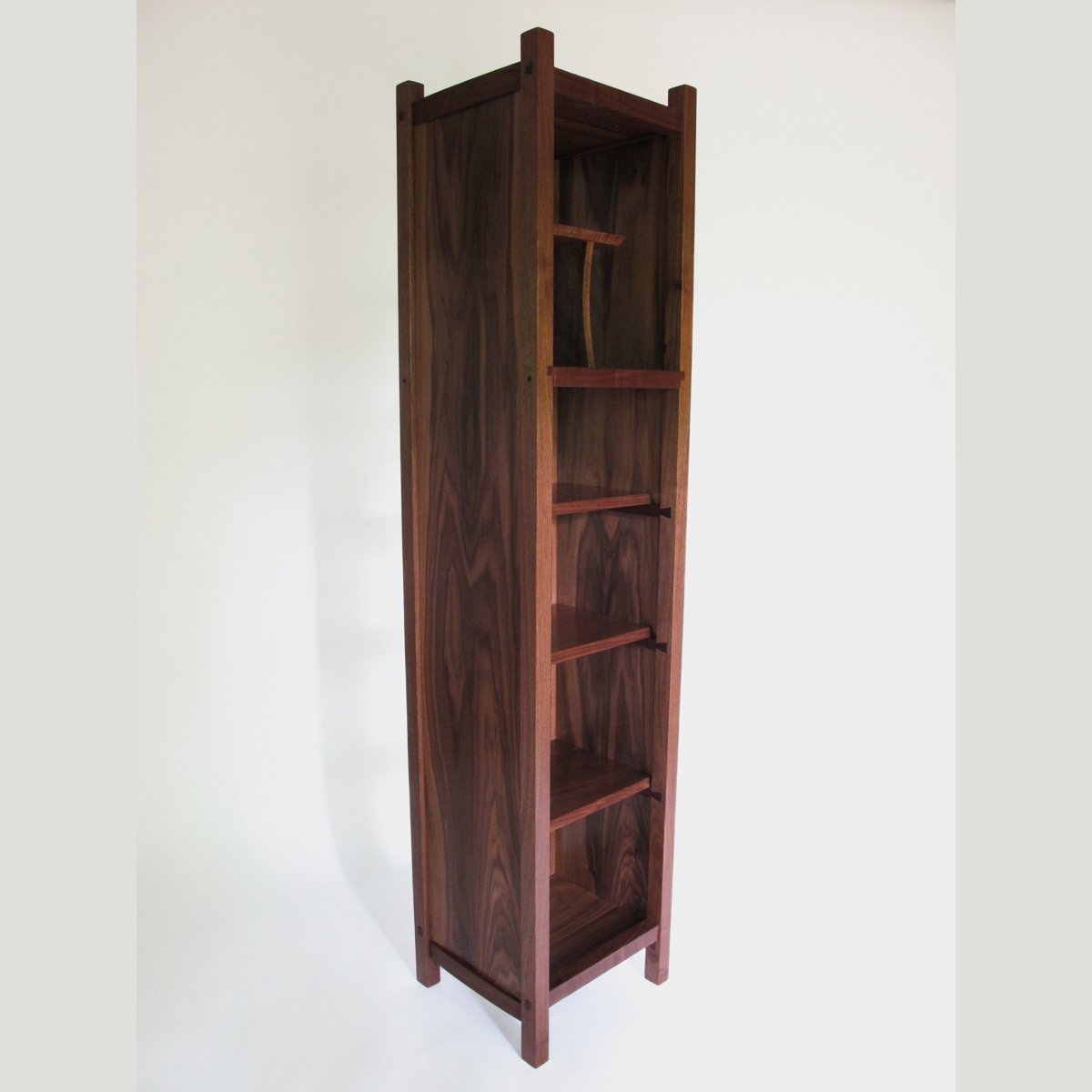 modern tall shelving storage tower with narrow display case by Mokuzai Furniture