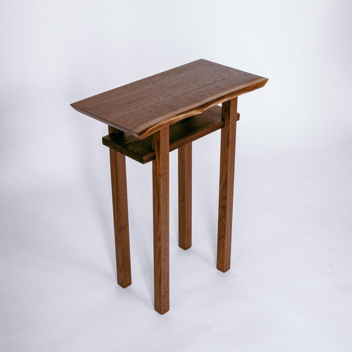 a modern walnut end table with shelf by Mokuzai Furniture- modern wood furniture designs for small spaces