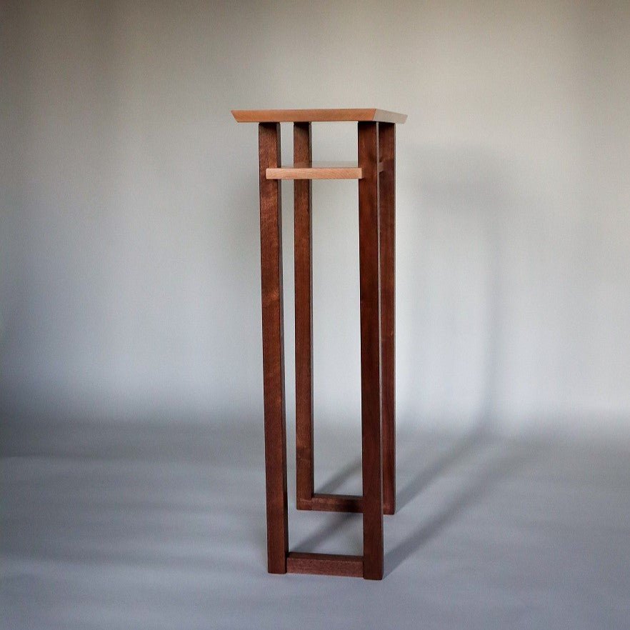 A narrow entry table handmade by Mokuzai Furniture.