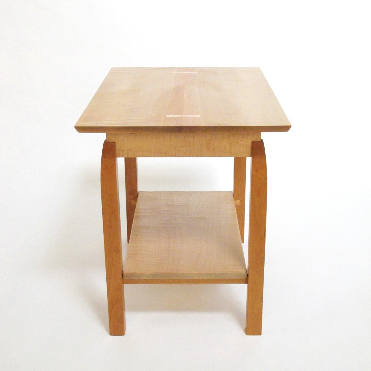 A narrow handmade side table from Mokuzai Furniture.