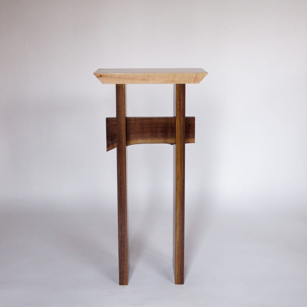 a small entry table that is tall and is a solid wood entry table by Mokuzai Furniture