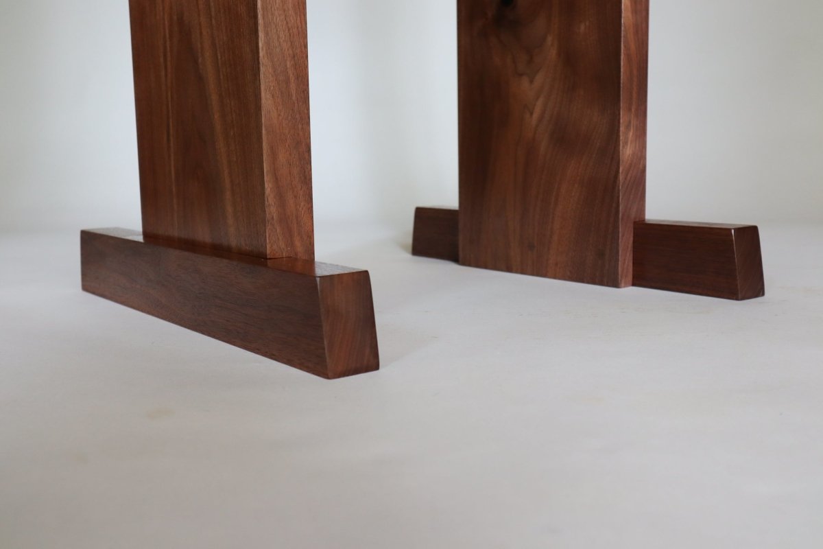 Feet details on our Statement Altar Table, a modern wood furniture design by Mokuzai Furniture