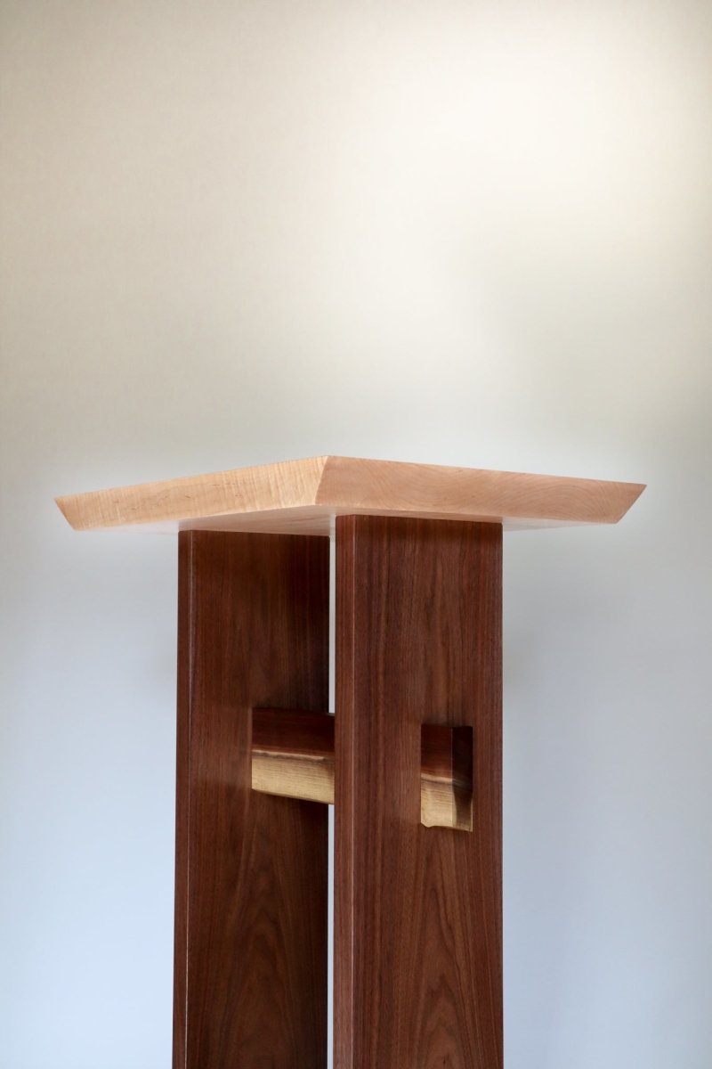 a narrow tall altar table by Mokuzai Furniture.  Minimalist zen home decor.