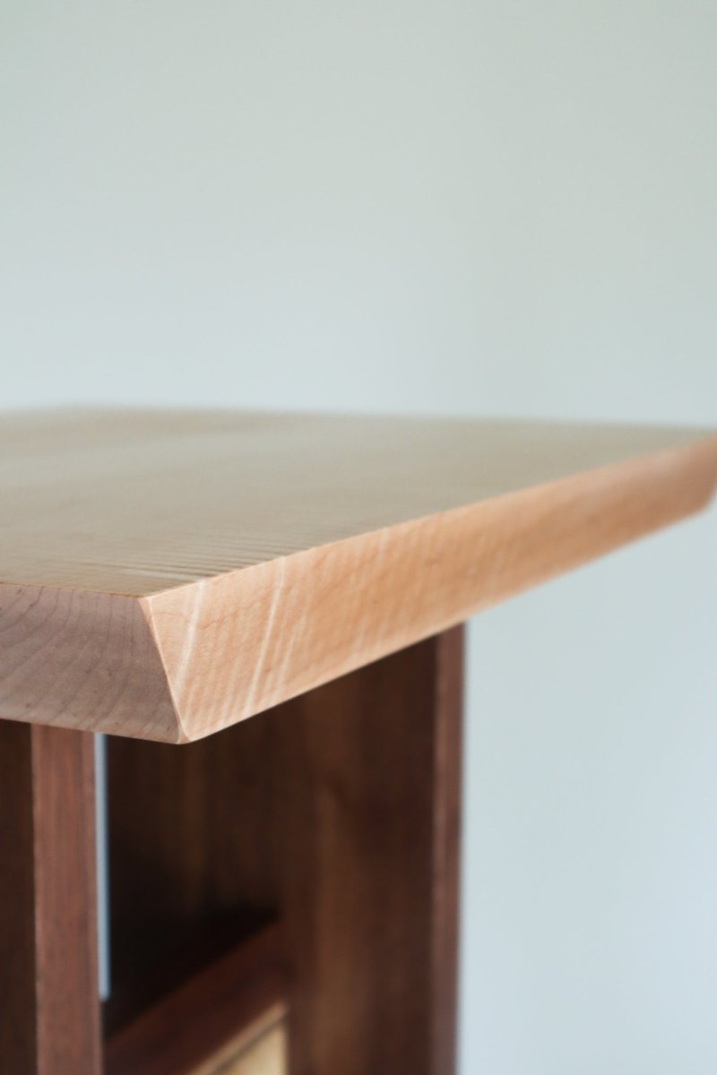 Fine edging details at the corner of this zen altar table by Mokuzai Furniture