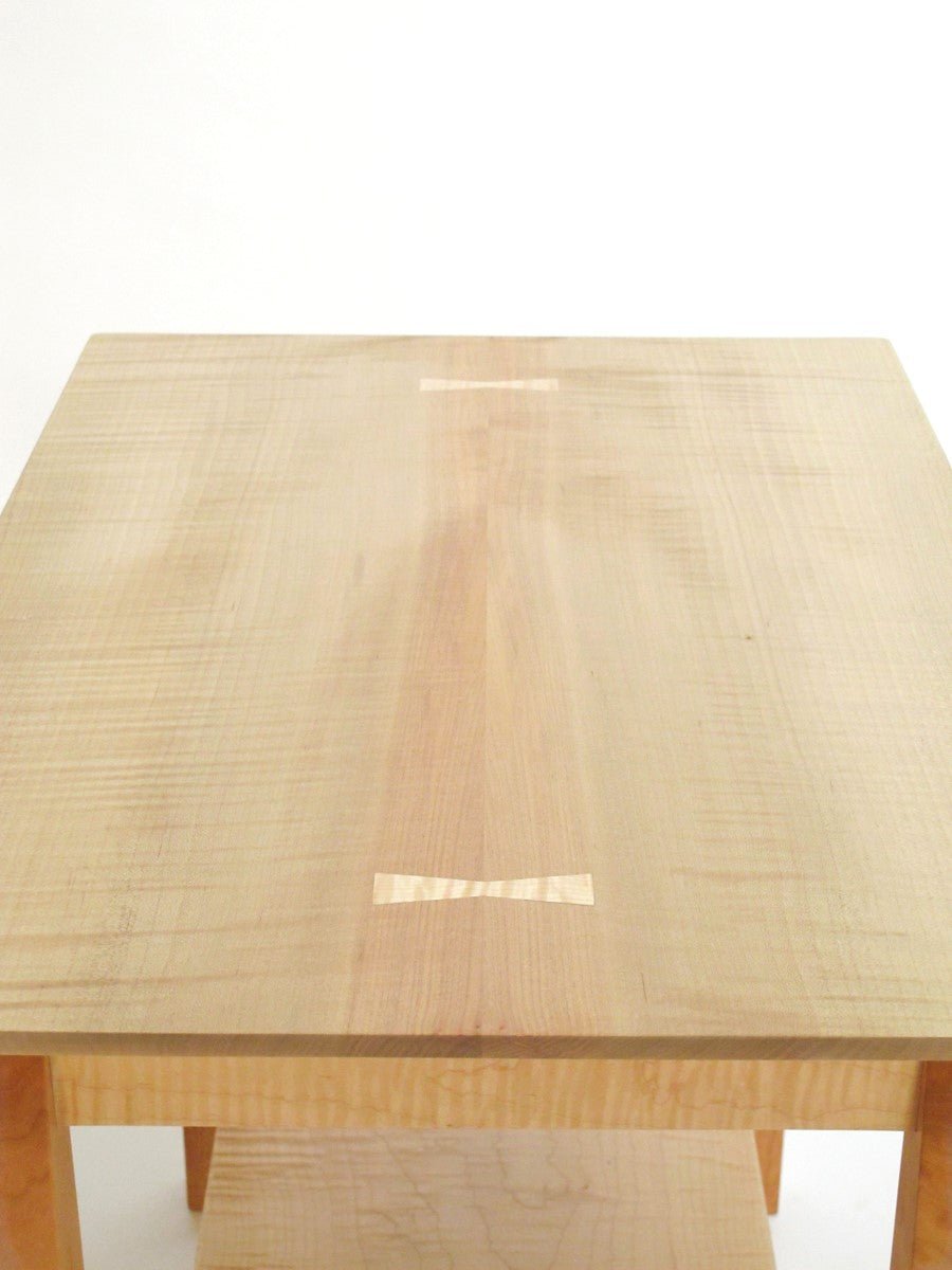 The tabletop of a contemporary side table that was handmade by Mokuzai Furniture.