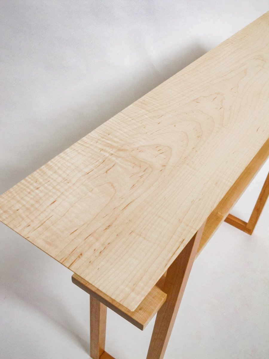 Beautiful grain patterns in the tiger maple table top of this narrow console table.  A sofa table, hallway table or entryway console table by Mokuzai Furniture
