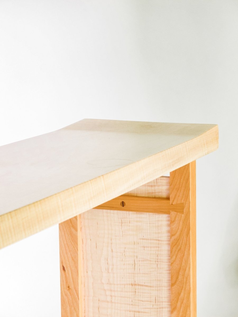 hand-cut dovetail details on the Shaped Console Table by Mokuzai Furniture - a narrow low console for entryway decor or as a table behind the sofa