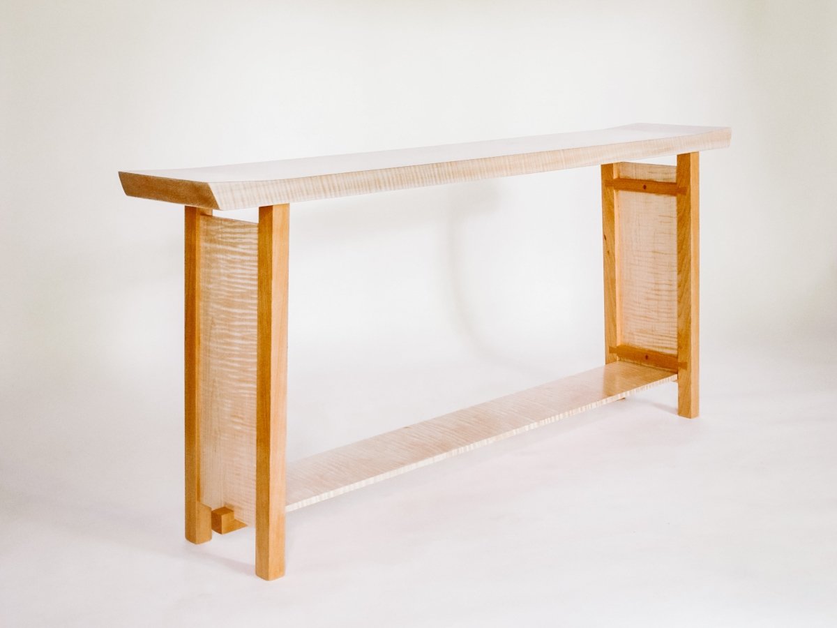 The Shaped Console Table by Mokuzai Furniture - a narrow low console created from tiger maple and cherry
